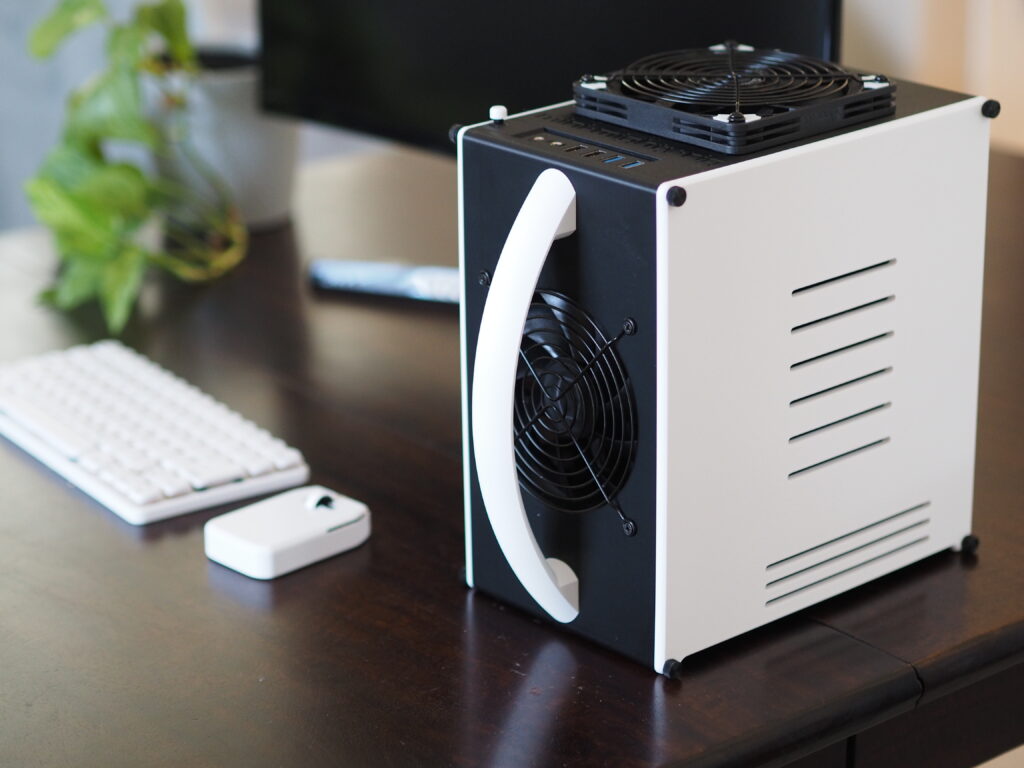 Mini Mighty Rig, Black and White — assembled with keyboard, on a desk