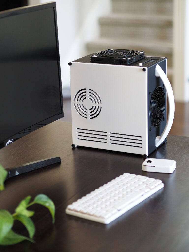 Mini Mighty Rig, Black and White — assembled with keyboard, on a desk