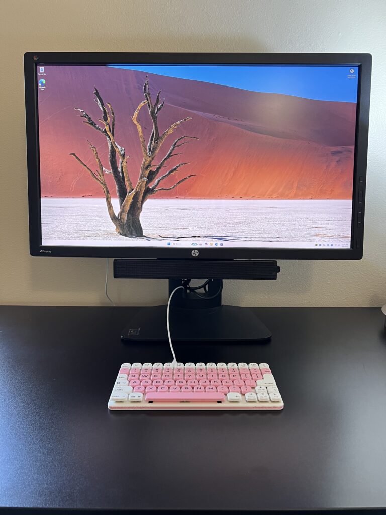 Mini Mighty Keyboard, Cherry Blossom v2 — on a desk
